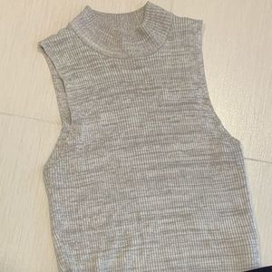 Francesca’s sleeveless mock turtle neck top size L
